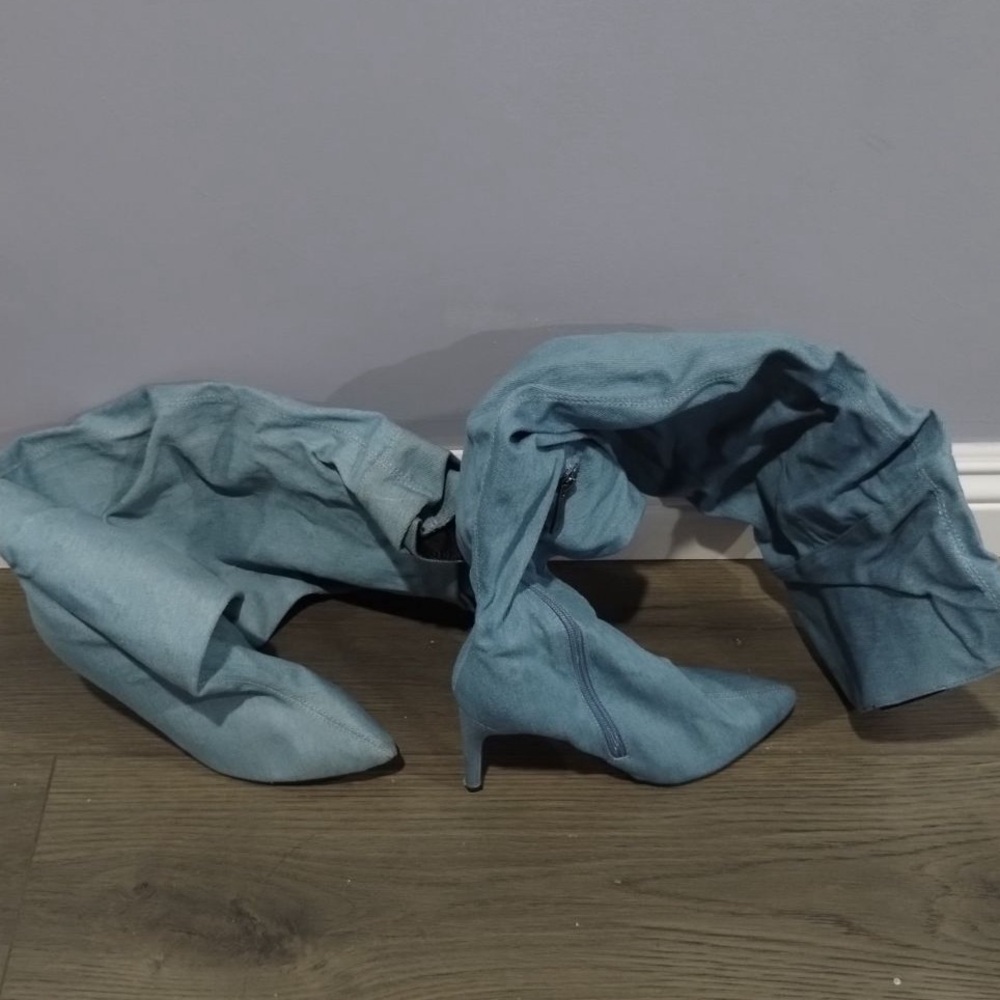 Light wash denim over the knee, pointed toe  boot with skinny heel size 6